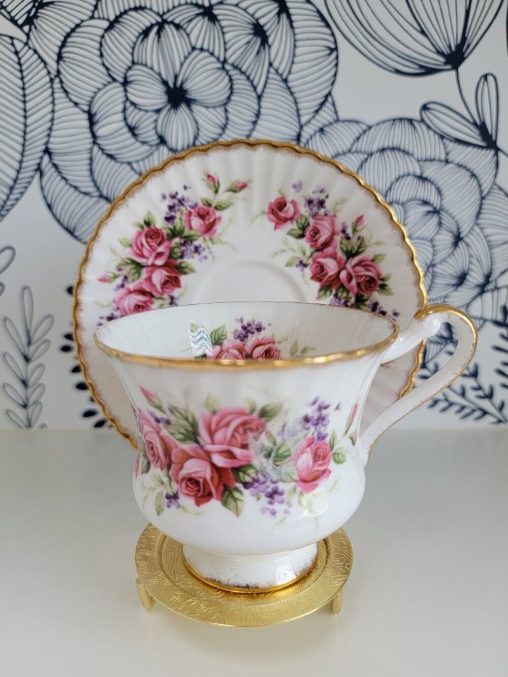 Paragon teacup and saucer with pink roses, purple violet accents gold trim, EUC